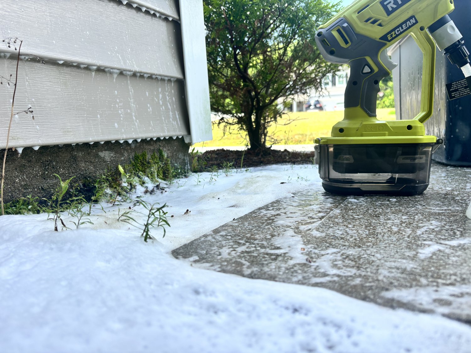 Pressure washing the driveway